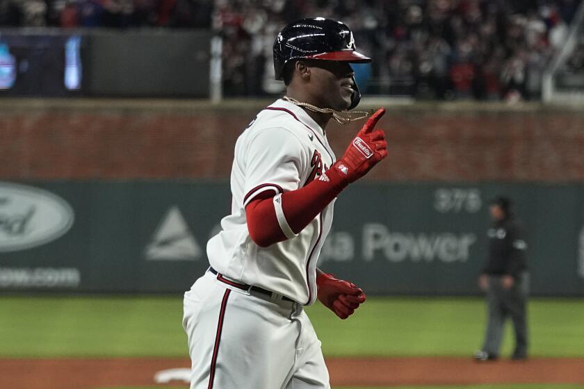 Atlanta Braves' Jorge Soler celebrates a home run during the seventh inning in Game 4.
