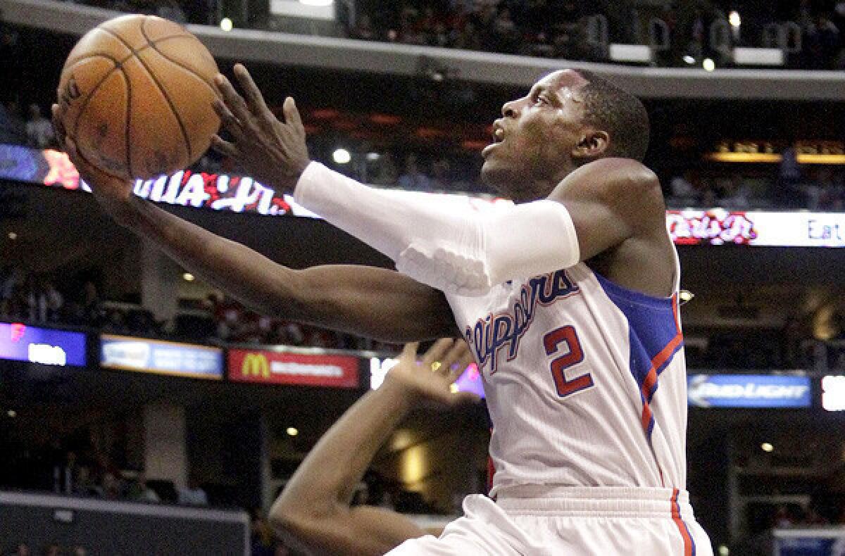 Clippers point guard Darren Collison, shown scoring this month against the Celtics, is nursing a big toe that he sprained in the first half against the Indiana Pacers on Saturday.