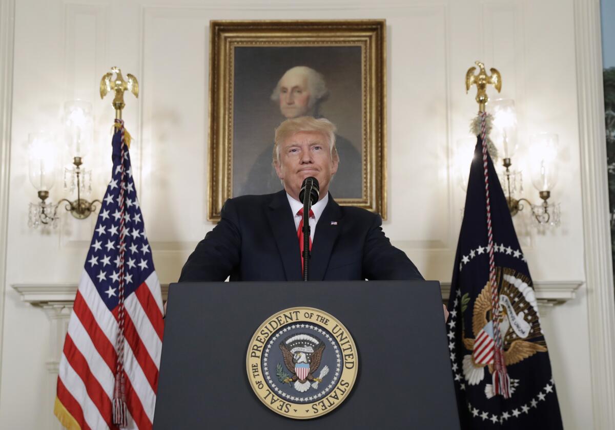 President Donald Trump pauses while speaking in the Diplomatic Reception Room of the White House in Washington, Monday, Aug. 14, 2017.