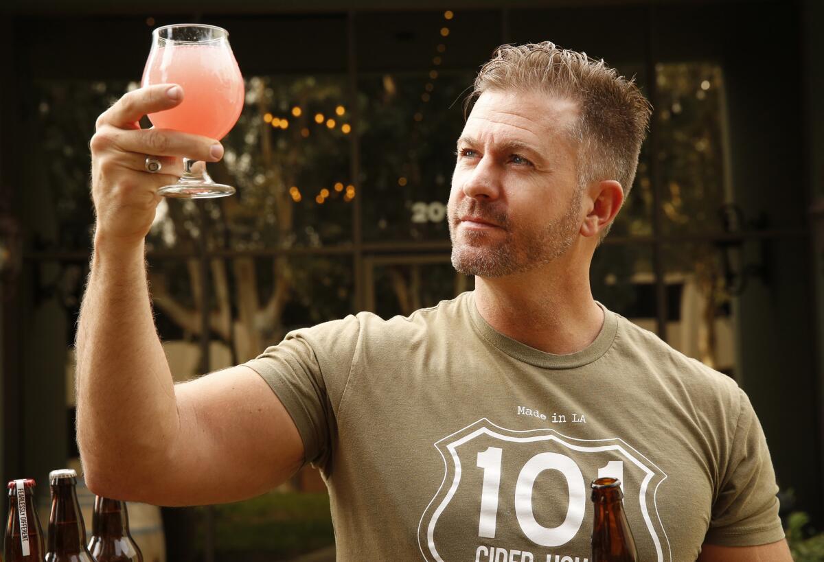 Mark McTavish, owner of 101 Cider, pours Cactus Red Cider, infused with local nopal cactus; and Thai basil.