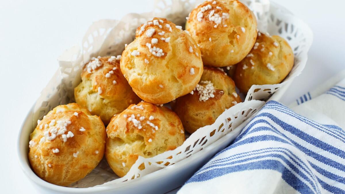 Chouquettes are baked pastry puffs dusted with sugar.