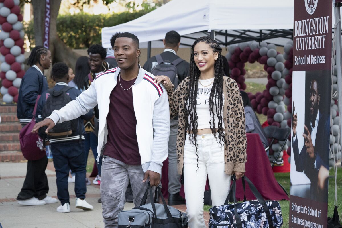 Two students arrive on campus at a fictional HBCU