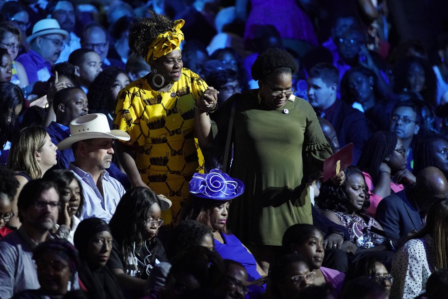 Audience members take their seats before the Democratic presidential primary debate Thursday, Sept. 12, 2019, at Texas Southern University in Houston.