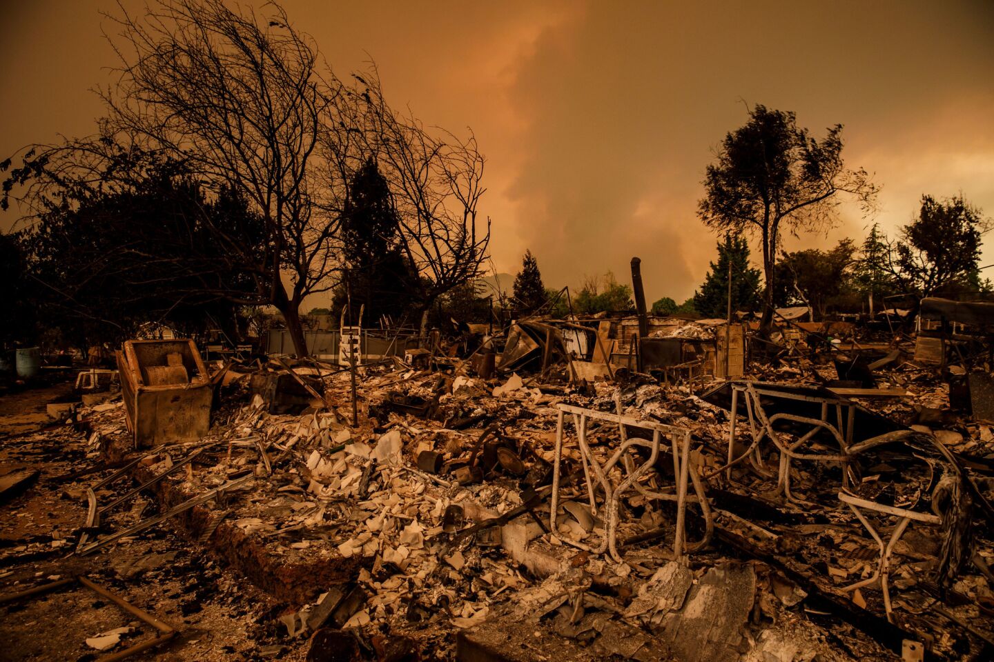 Wildfire destroyed homes overnight in Lake Keswick Estates near Redding on July 27.
