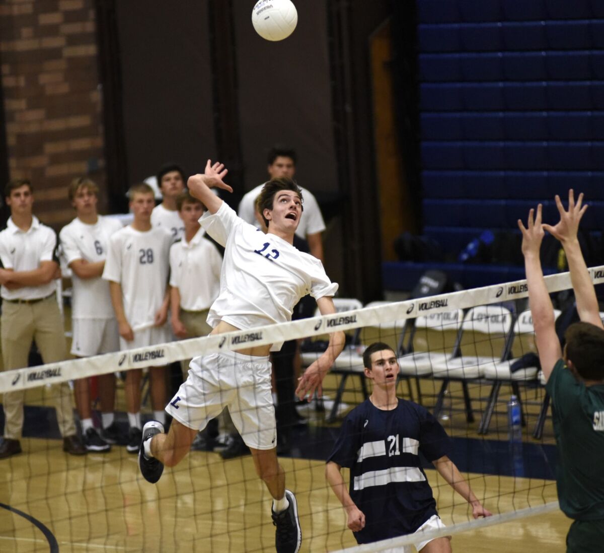 Sean Kelly of Loyola with a kill.