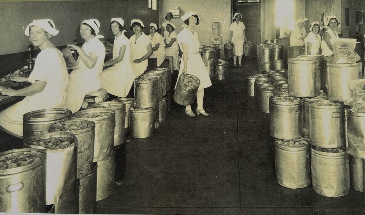 Female employees filled and sealed ironed wax paper bags with chips in the Monterey Park plant.