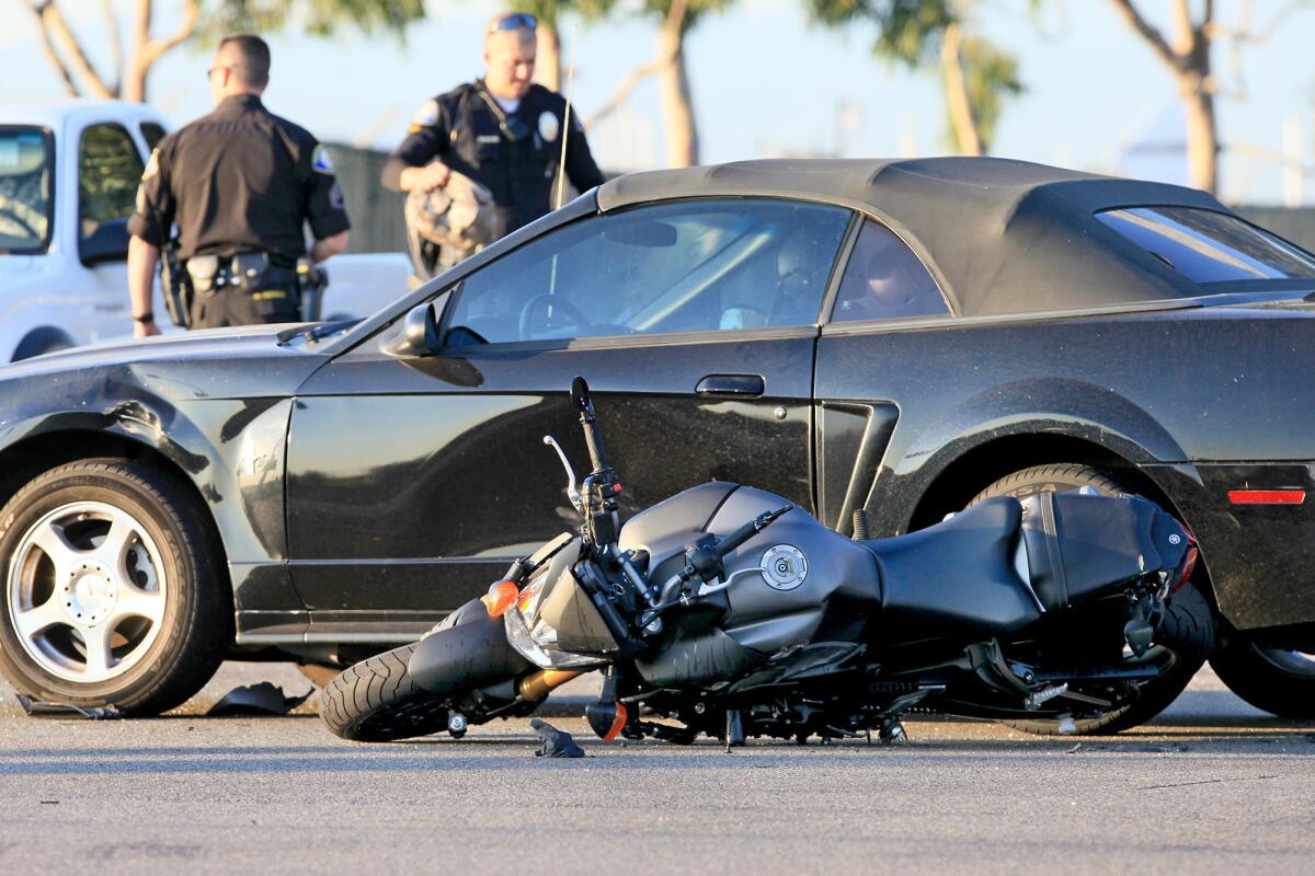 The scene of a seven-vehicle crash in which a motorcyclist was killed along the northbound side of Bristol Street, at Campus Drive in Newport Beach on Thursday.