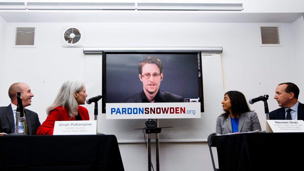 Edward Snowden, via satellite from Moscow, Russia, speaks about a new campaign to persuade President Obama to pardon him, in New York on Sept. 14.