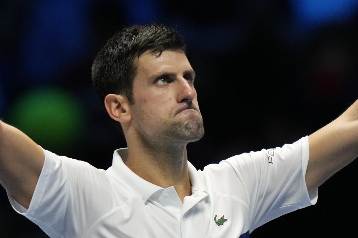 Serbia's Novak Djokovic celebrates after defeating Russia's Andrey Rublev during their ATP World Tour Finals singles tennis match, at the Pala Alpitour in Turin, Wednesday, Nov. 17, 2021. (AP Photo/Luca Bruno)