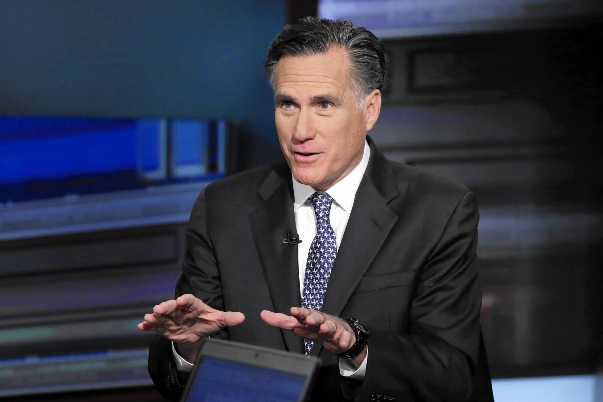 Mitt Romney is interviewed by Neil Cavuto during his "Cavuto Coast to Coast" program on the Fox Business Network on March 4. Romney forcefully denounced Trump's bid for the Republican presidential nomination.