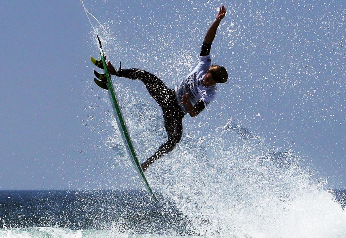 Marco Mignot of France gets air on a turn during Thursday's action.