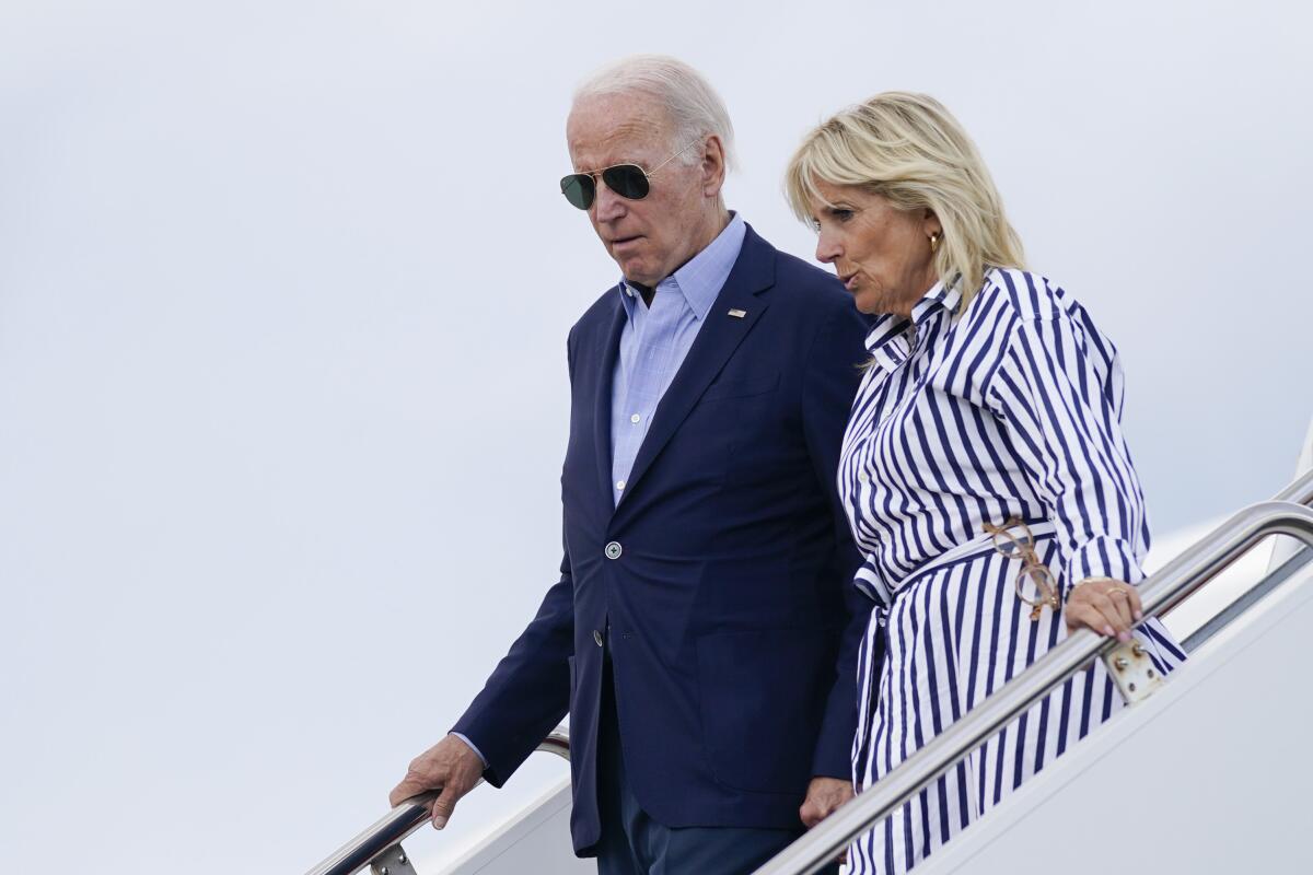 President Joe Biden and first lady Jill Biden arrive at Andrews Air Force Base.