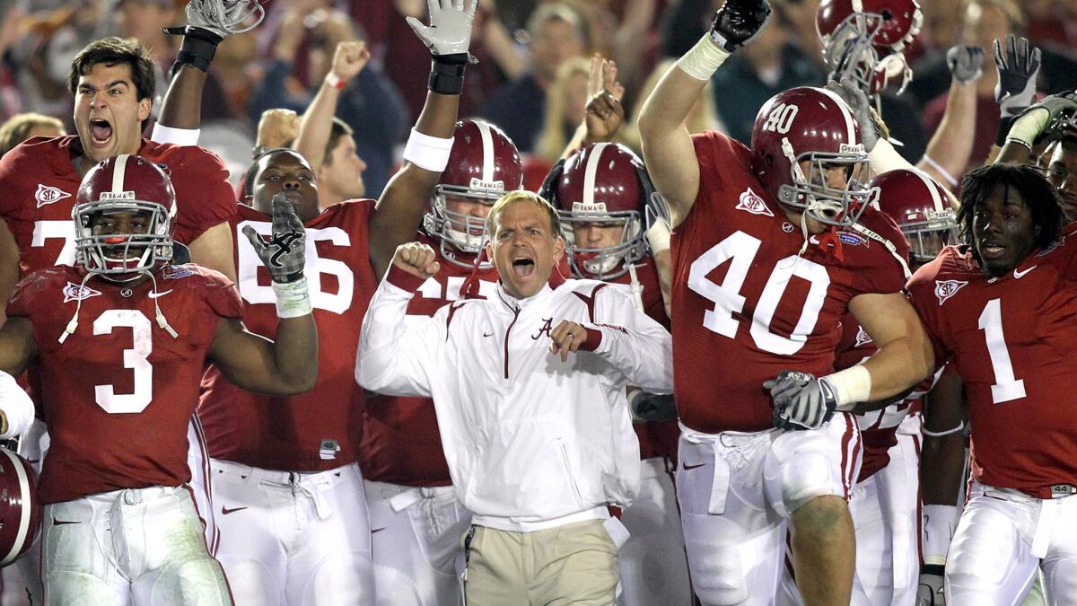 Trevor Moawad celebrates among Alabama players during a victory over Texas in the BCS national title game Jan. 7, 2010, at the Rose Bowl.