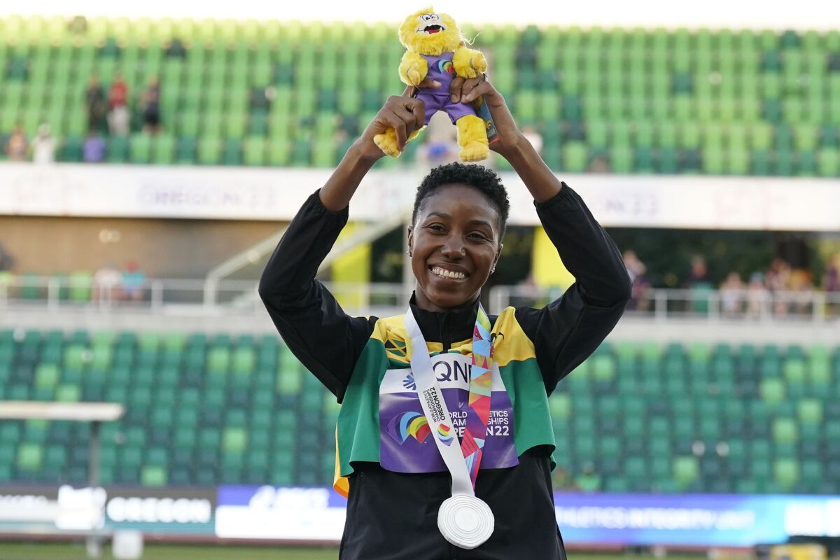 SDSU alum Shanieka Ricketts of Jamaica celebrates her silver medal in the triple jump at the World Championships.