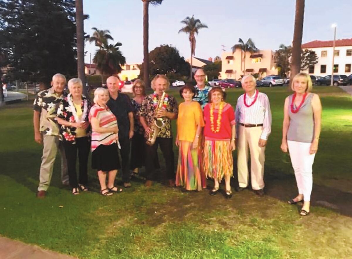 Outside the La Jolla Rec Center are La Jolla Newcomers Club members Duane and Lynn Knize, Edys Quellmalz, Bill Bethard, Jan Searleman, sax player from the band BREEZ’N, Sarah Forster, Alan Searleman, Fran Zimmerman, Wolf Forster and Jan Morris.