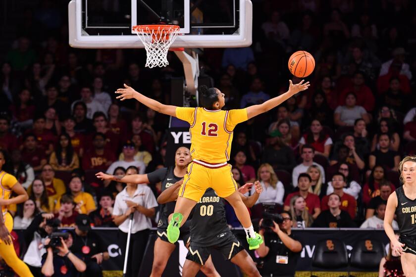LOS ANGELES, CA - FEBRUARY 23: USC Trojans guard JuJu Watkins (12) loses the ball going up for a shot.