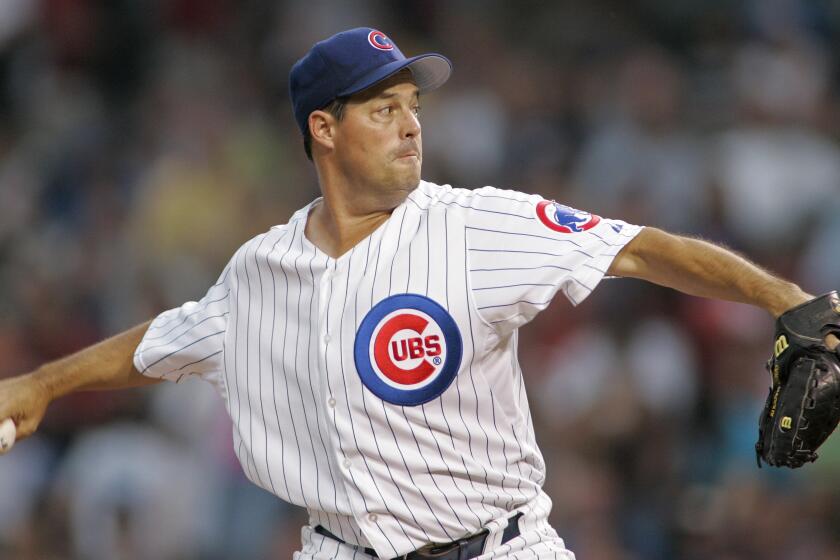 FILE - In this July 19, 2006 photo, Chicago Cubs starting pitcher Greg Maddux throws during the first inning of a baseball game against the Houston Astros at Wrigley Field in Chicago. Maddux has rejoined the Chicago Cubs as an assistant to general manager Jim Hendry. The 355-game winner, who started his major league career with the Cubs in 1986 and rejoined them from 2004-06, retired as a player after the 2008 season. (AP Photo/Brian Kersey)
