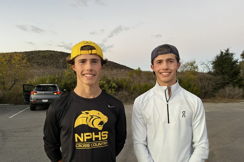 Distant runners Lex (left) and Leo Young of Newbury Park signed with Stanford.