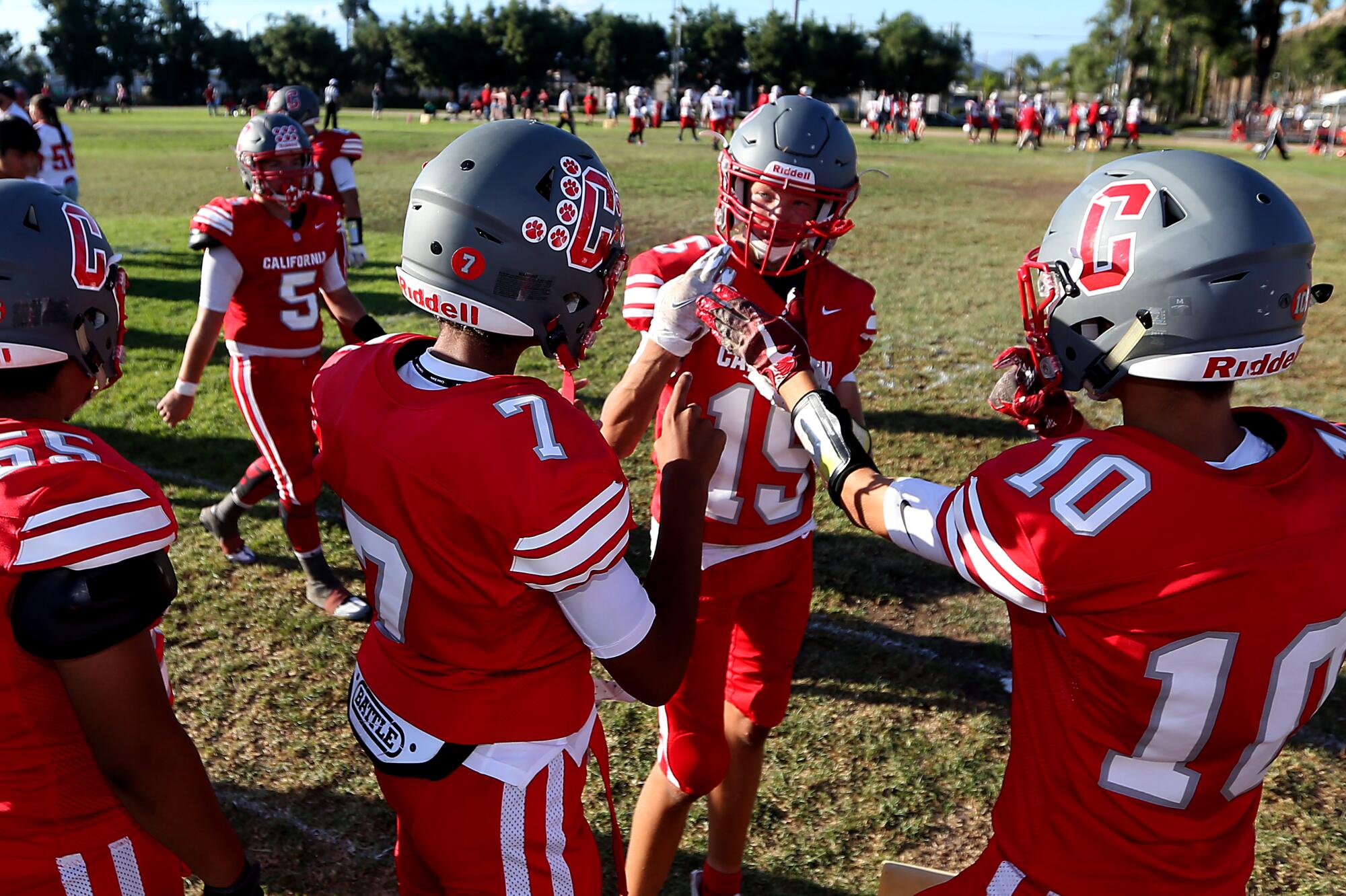 CSDR football player communicate in sign language during a game Saturday.