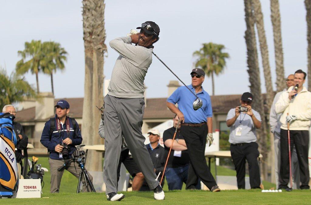 Team UCLA's Jim Hill tees off during the second annual Toshiba Classic Skills Challenge at Newport Beach Country Club on Tuesday.