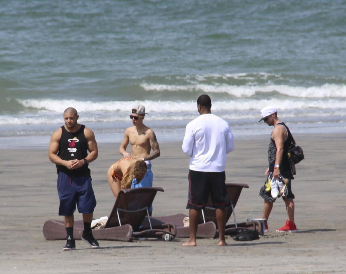 Pop star Justin Bieber, third from left, was in Panama over the weekend but was reportedly headed back to the United States, where he'll face arraignment in a DUI case.