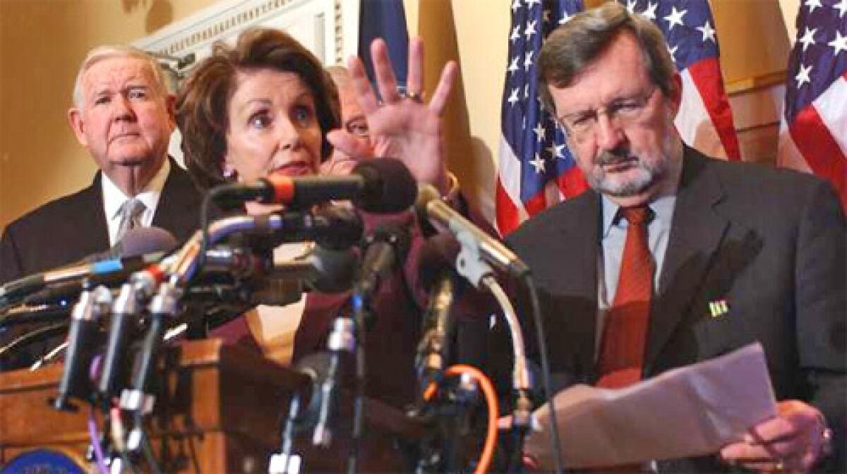 THE START OF TROUBLE: Speaker Nancy Pelosi, announcing the Democratic withdrawal plan in March, called herself "the last person to ask about Republican votes." She turned out to be right, but probably not in the way she meant. She is flanked by Reps. John P. Murtha (D-Pa.), left, and David R. Obey (D-Wis.).