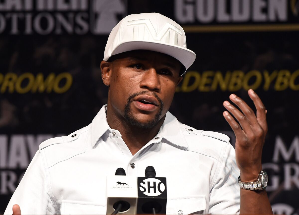Talks between Floyd Mayweather Jr. and Manny Pacquiao for a bout have made progress with both sides agreeing to a location of the fight and drug-testing plan, though no deal has been made.