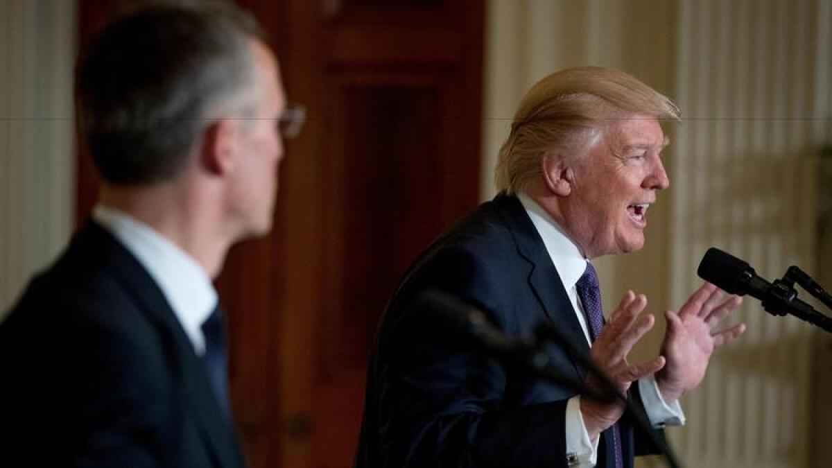 President Trump, accompanied by NATO Secretary-General Jens Stoltenberg