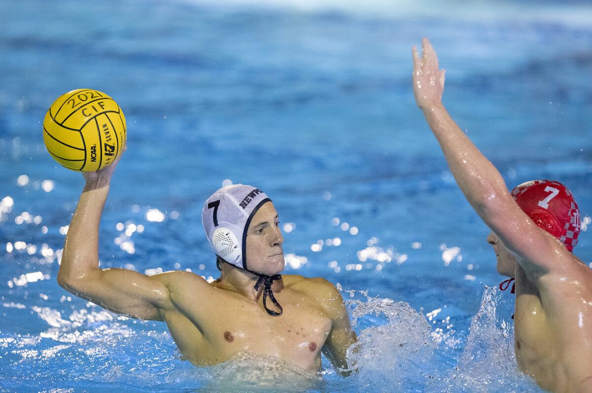 Newport Harbor's Mason Hunt takes a shot against Mater Dei's Logan McCarroll during Wednesday night's match.