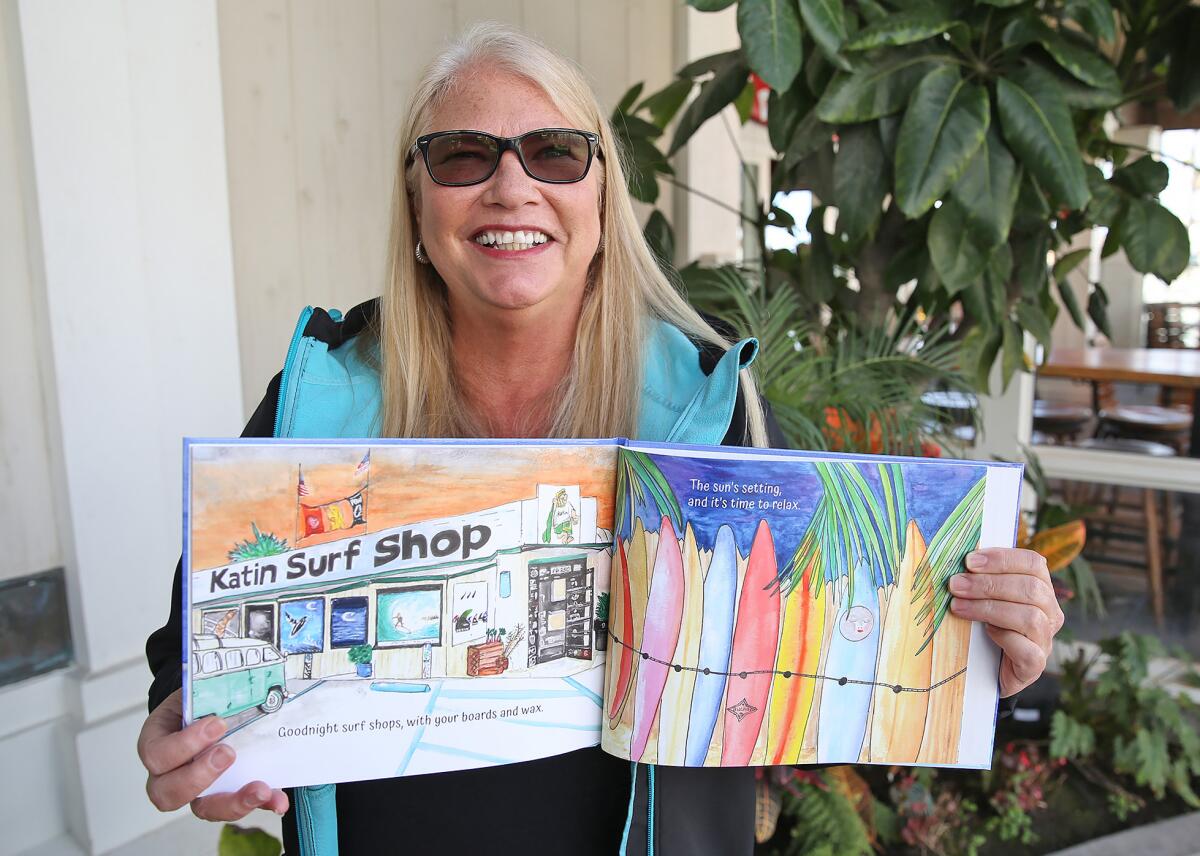 Huntington Beach author Toni Haas shows her new children's book, "Goodnight Surf City."
