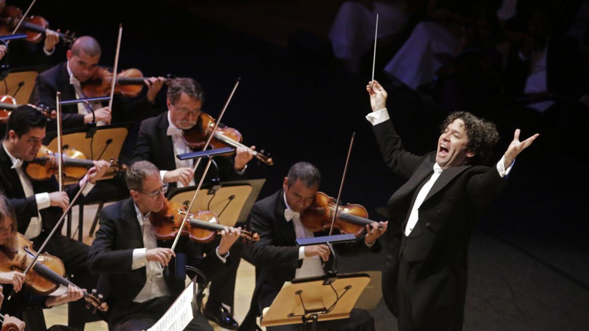 Gustavo Dudamel is exuberant, but nonpolitical, conducting Beethoven during the L.A. Phil’s opening night gala at Disney Hall.