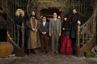 "WHAT WE DO IN THE SHADOWS" -- Pictured (L-R): Kristen Schaal as The Guide, Kayvan Novak as Nandor, Harvey Guillen as Guillermo, Mark Proksch as Colin Robinson, Natasia Demetriou as Nadja, Matt Berry as Laszlo. CR: Russ Martin/FX