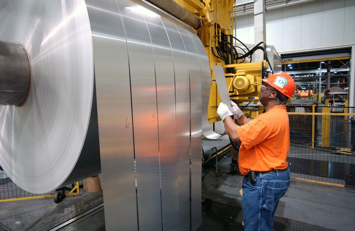 An employee works at an Alcoa plant in Newburgh, Ind.