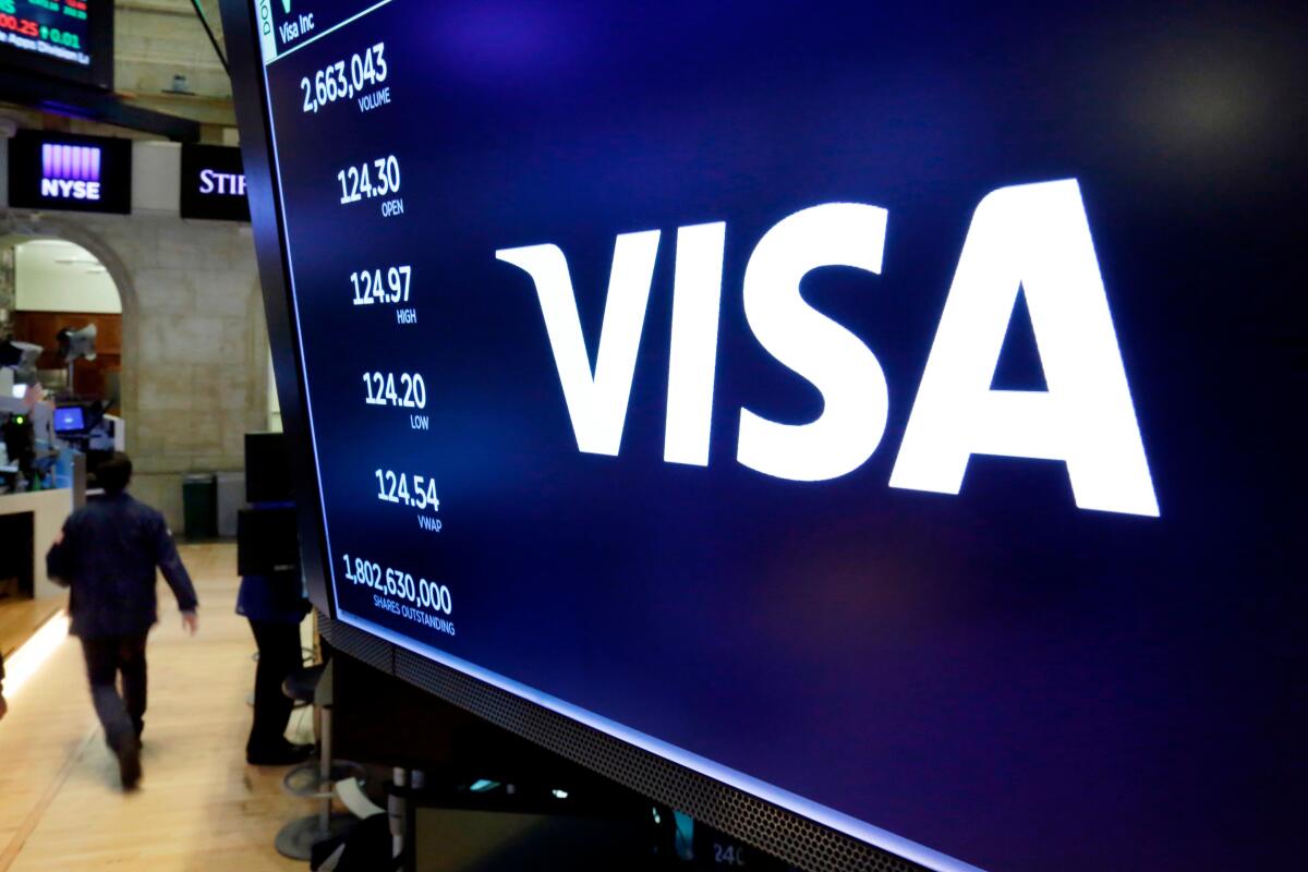 The Visa logo on a screen at the New York Stock Exchange