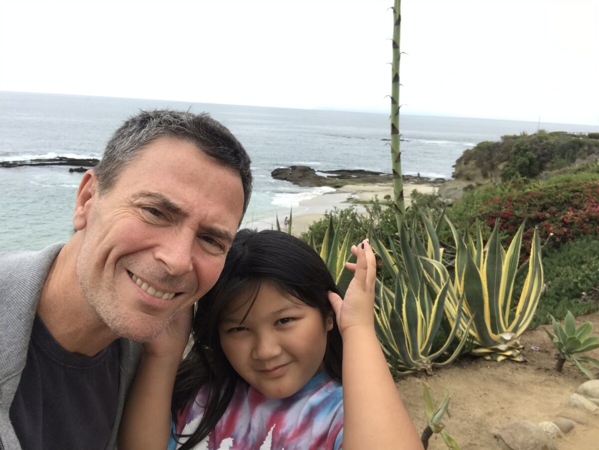 Jeff Light and his daughter Fu visit Sunset Cliffs.