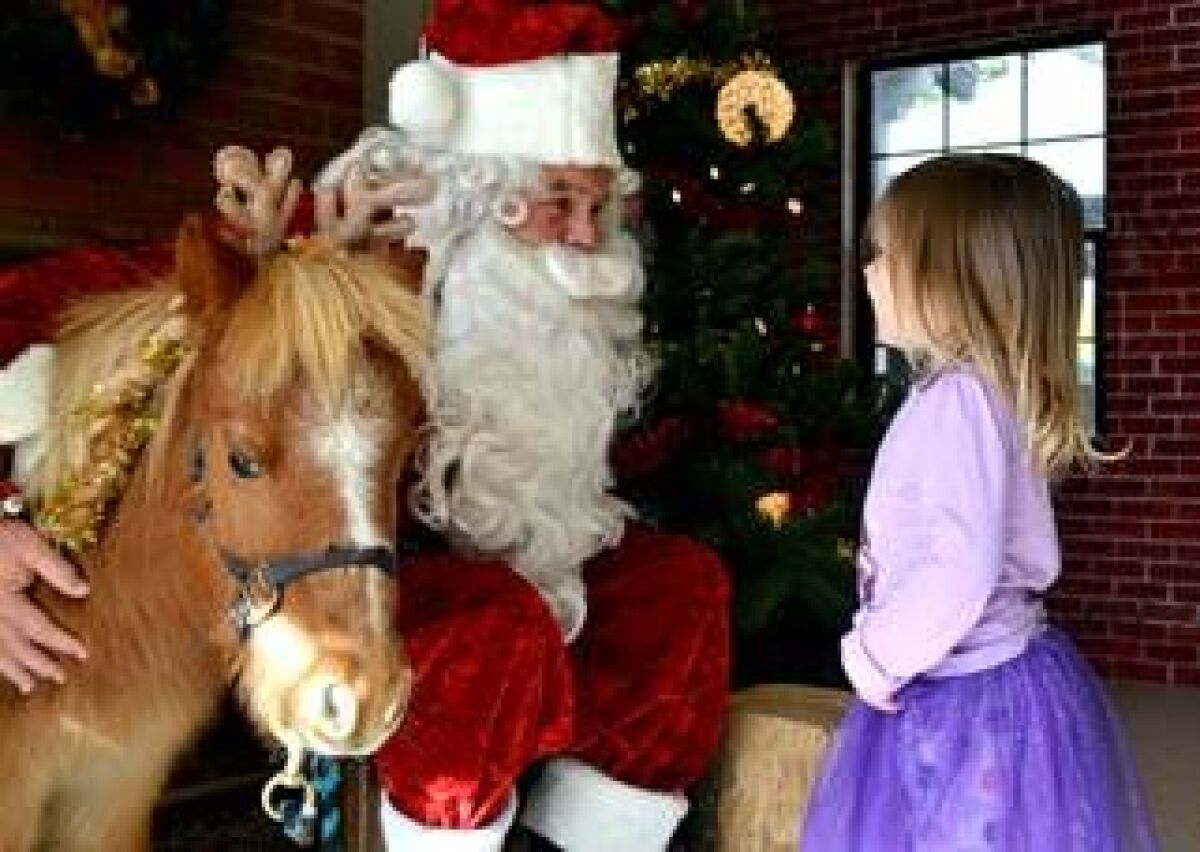 Helen Woodward Animal Center’s Frosty Farm event offers children the opportunity to meet Santa, furry friends and more.
