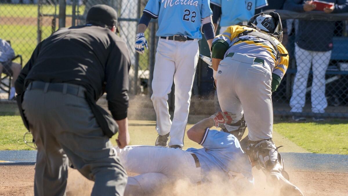 Connor Aoki, shown playing catcher on March 15, hit a two-run home run in the first inning of Edison High's 9-3 win against Newport Harbor on Wednesday.