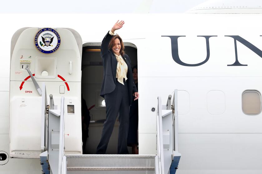 EL-SEGUNDO-CA-JUNE 1, 2024: Vice President Kamala Harris waves before departing Los Angeles International Airport for a political event in Seattle, Washington on June 1, 2024. (Christina House / Los Angeles Times)