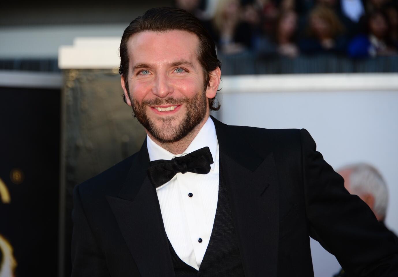 Lead actor nominee Bradley Cooper ("Silver Linings Playbook") arrives on the red carpet for the Oscars.