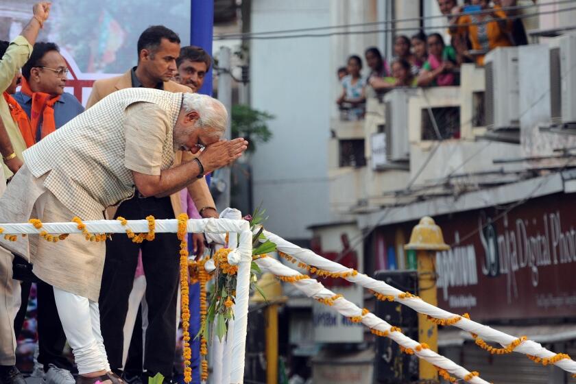 Narendra Modi bows to the crowd in Vadodara after his Bharatiya Janata Party's victory in India's national election.