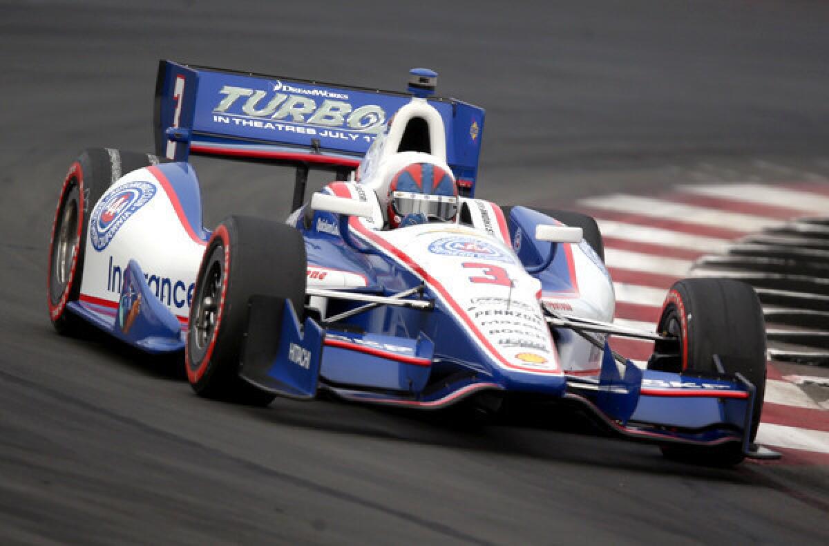 Helio Castroneves guides his No. 3 Team Penske Dallara Chevrolet through a turn at the Toyota Grand Prix of Long Beach on Sunday.