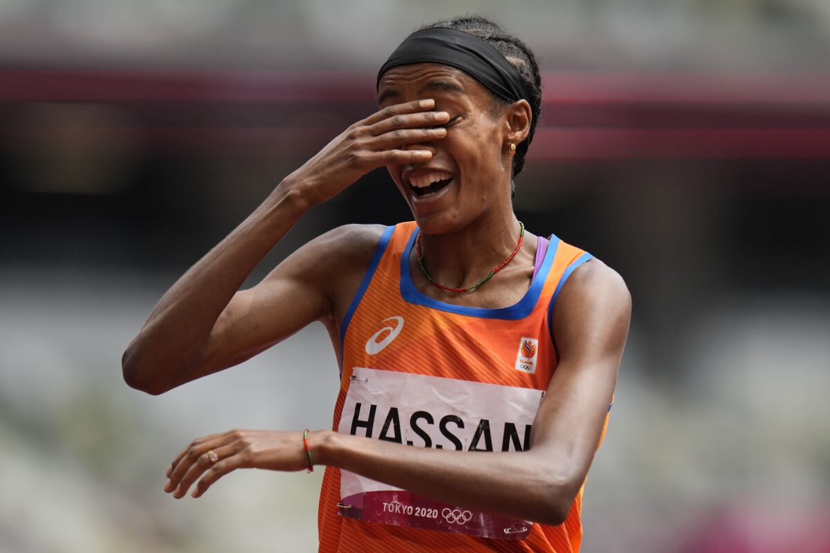 Sifan Hassan, of the Netherlands, reacts after winning her heat of the women's 1,500-meters at the 2020 Summer Olympics, Monday, Aug. 2, 2021, in Tokyo. (AP Photo/Petr David Josek)