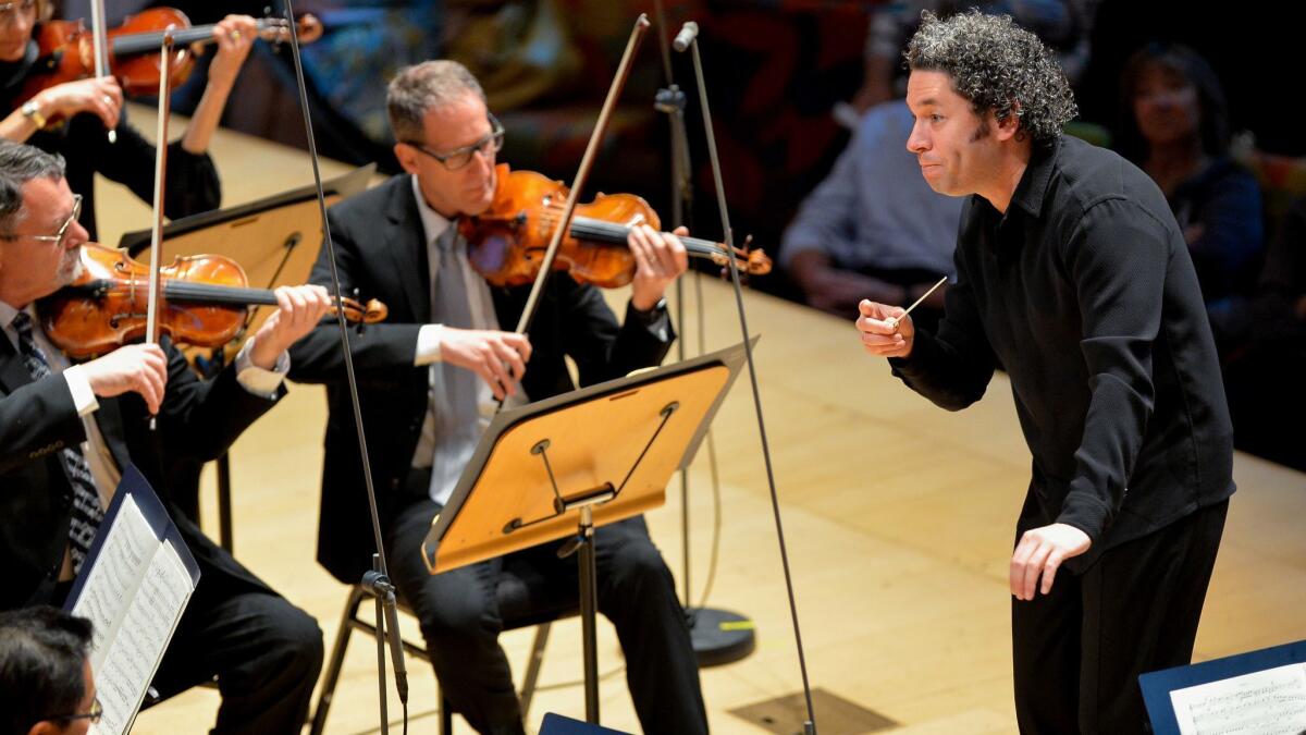 Gustavo Dudamel conducts the Los Angeles Philharmonic in Schumann's Overture to "Genoveva" at Walt Disney Concert Hall Friday.