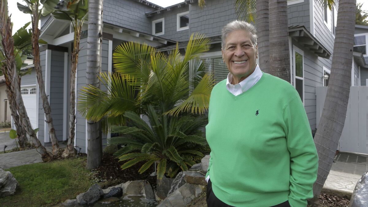 Brian Wofford, 68, outside his Encinitas home, which was dramatically tansformed 15 years ago on the ABC TV series "Extreme Makeover: Home Edition."