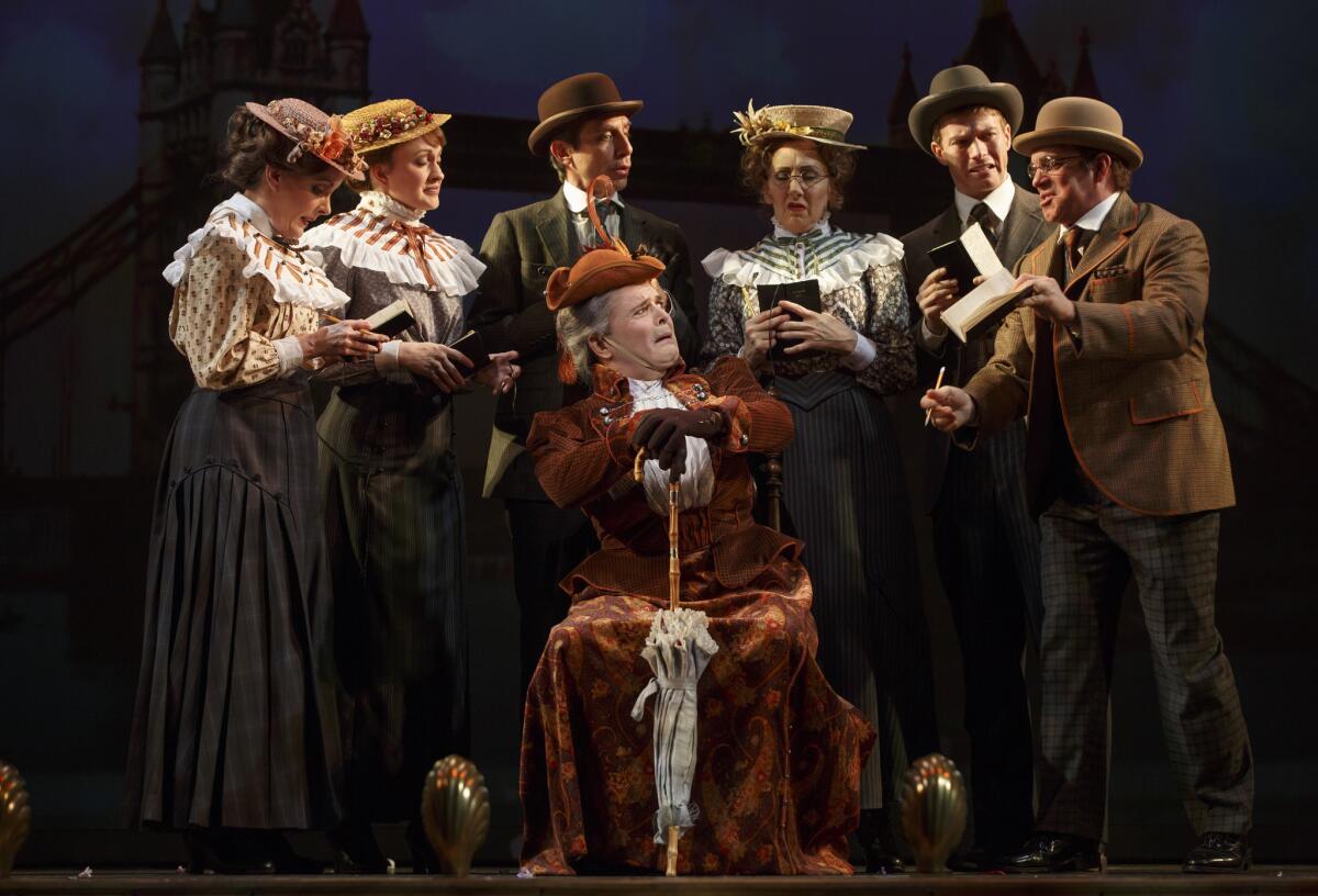Actor Jefferson Mays, seated, with the cast of "A Gentleman's Guide to Love and Murder," at the Walter Kerr Theatre in New York in 2013.