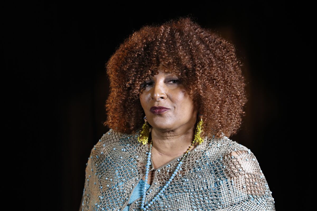 FILE -Actress Pam Grier is interviewed by The Associated Press, Aug. 25, 2017 in Washington. Grier is still going strong in an almost 50 year movie and television career. With over 50 years of experience in Hollywood, Pam Grier is ready to look back at her life and career in a new podcast debuting this fall. Turner Classic Movies said Wednesday, April 20, 2022 that Grier will be the spotlight of the next season of “The Plot Thickens,” with host Ben Mankiewicz (AP Photo/Jacquelyn Martin, File)