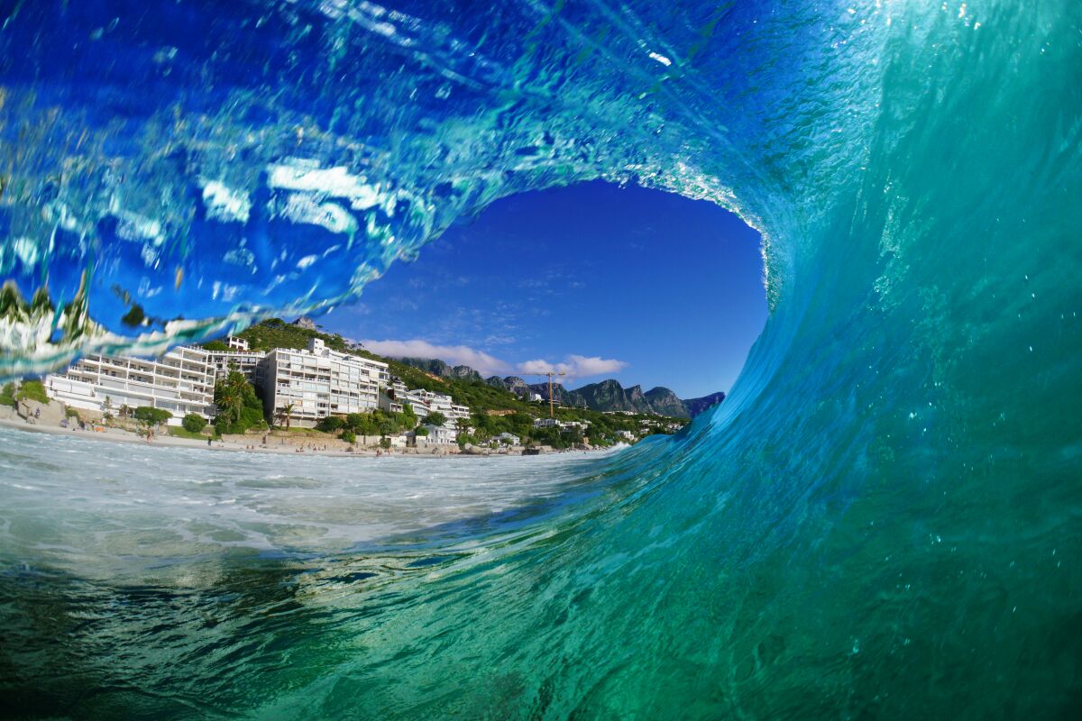 A wave breaks at Clifton Beach, Cape Town, a surfing spot at the southern tip of South Africa. Photo taken in 2017.
