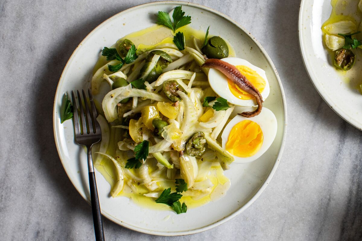 A fennel salad with anchovy and olives.