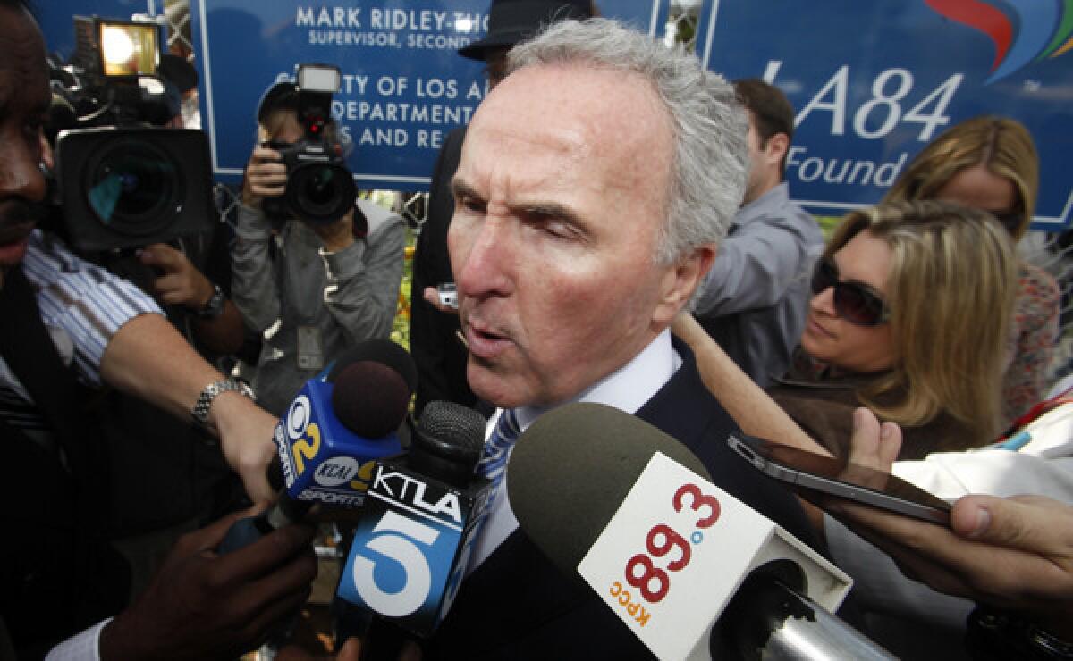 It appears former Dodgers owner Frank McCourt isn't going away anytime soon.