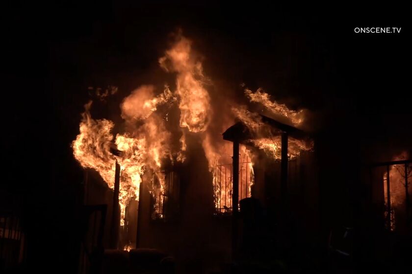 Two people died and three others were hospitalized after a fire ripped through a Logan Heights home on Clay Avenue early Sunday morning.